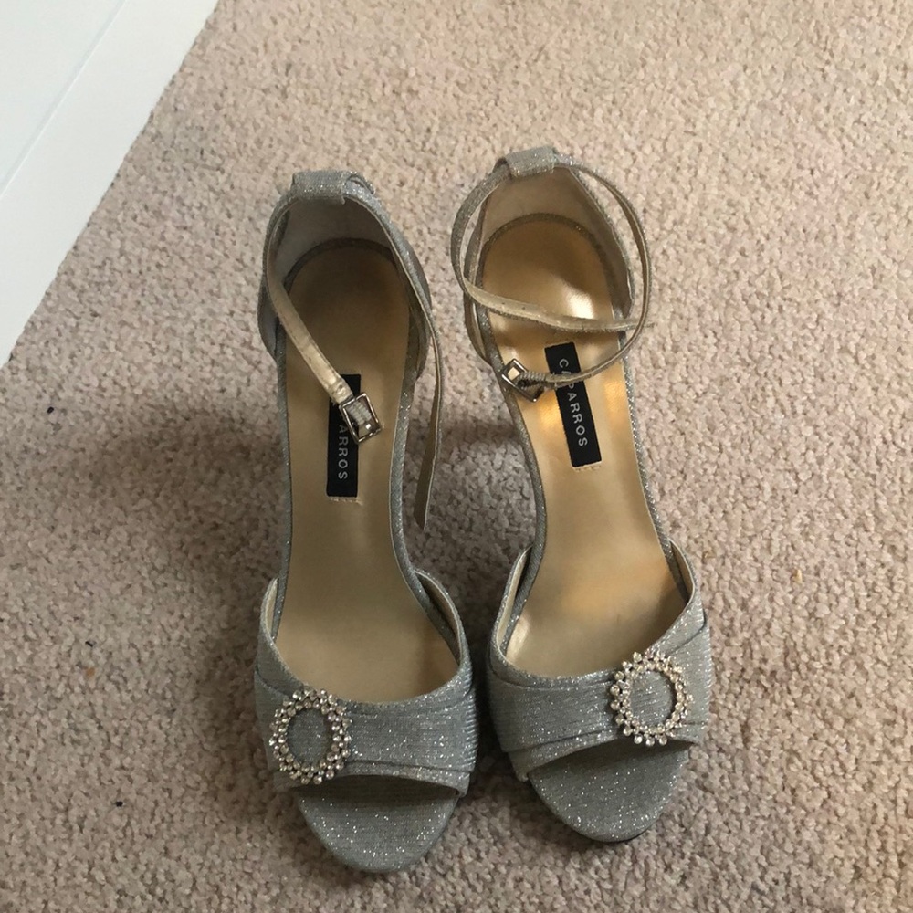 Silver with diamanté buckle shoes. Never worn.